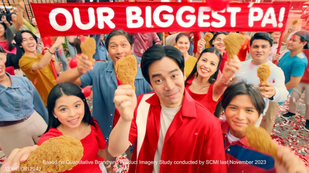 Joshua Garcia proudly raises his biggest Jollibee Chickenjoy